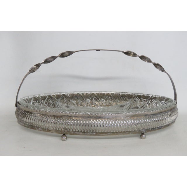 This charming Divided Serving Dish is made of pressed glass and metal. This beautiful dish has brilliant vintage style:...