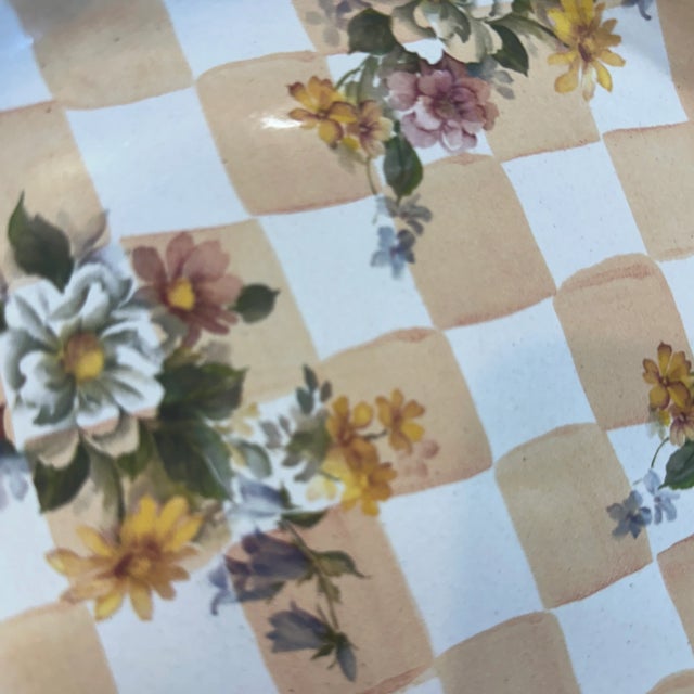 Classic checkered soft white and beige with floral motif hand painted terracotta plate from Mc Kenzie Childs. Made in USA....