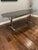 Superbly sleek Antonio Citterio Maxalto Pathos Elliptic dining table having glossy black anthracite top and X design...