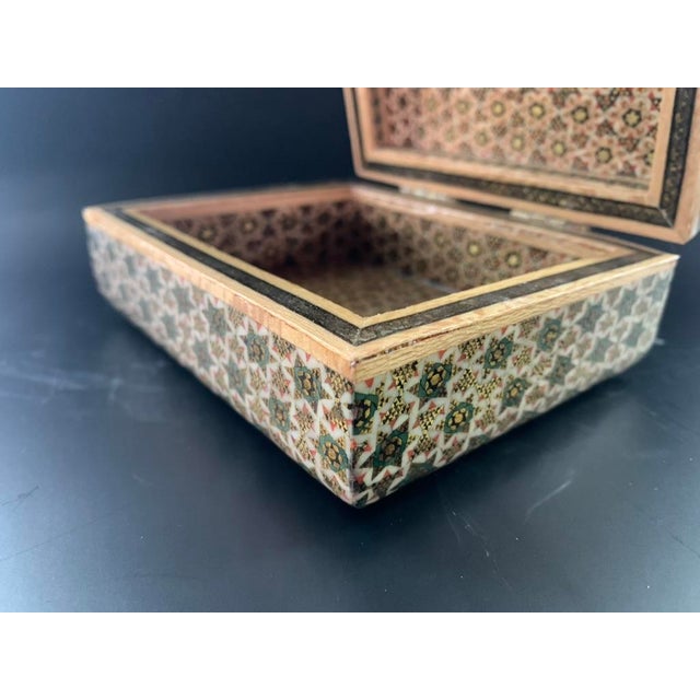 An exquisite vintage Persian Khatamkari decorative box featuring an incredibly detailed, all-over micro-mosaic marquetry...
