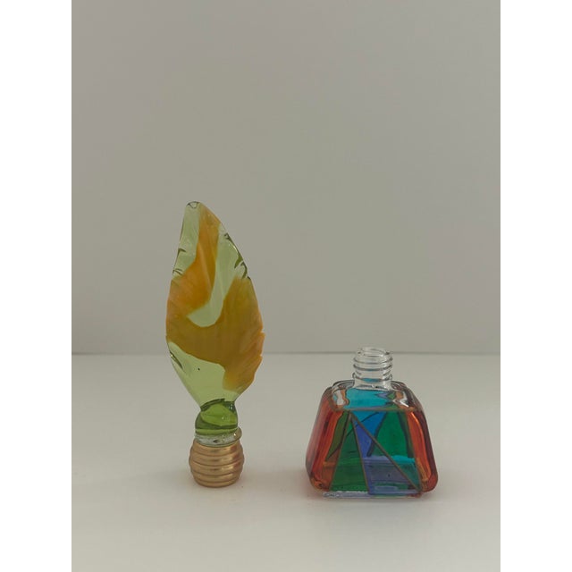 This perfume bottle is a classic example of Murano art glass craftsmanship. Murano glass is world-renowned for it's...