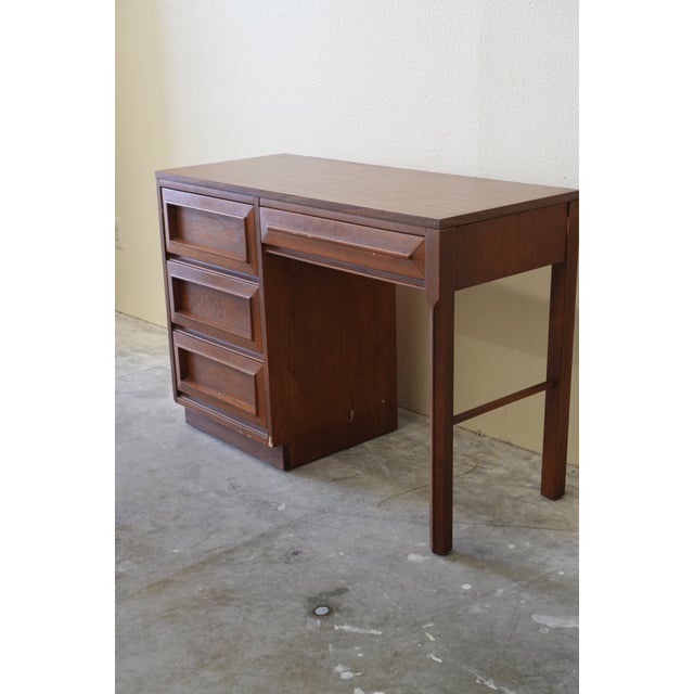Stunning vintage desk from the Linear collection by Morris of California (1960s-1970s), crafted in rich walnut with clean...