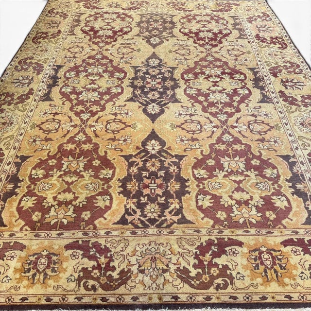 This vintage Sivas rug from Turkey, approximately 50 years old, showcases a sophisticated allover design defined by a...