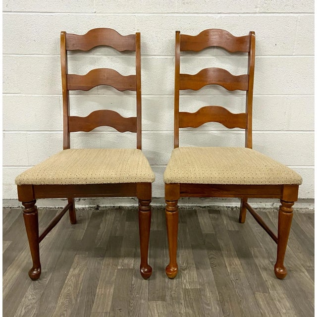 This is a gorgeous pair of vintage Broyhill French style Ladderback dining chairs with cabriole legs. Solid and sturdy,...