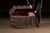 Domed-top immigrant steamer chest constructed in wood with a fully clad embossed metal exterior, reinforced by iron...