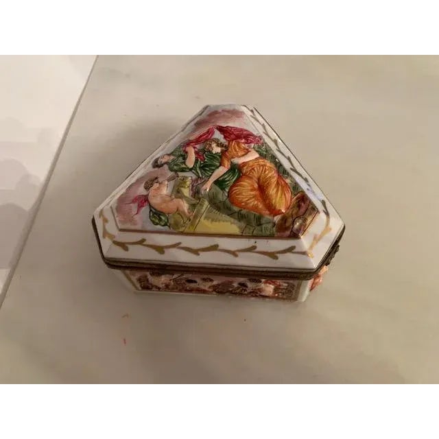 This is an antique jewelry box by Haviland. Marked; Hand-painted. Made in France. Haviland & Co. is a manufacturer of...