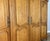 Wood Vintage Louis XVI French Oak Four Door Carved Armoire For Sale - Image 7 of 11