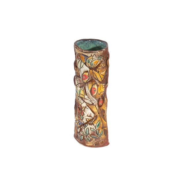 A 2012 studio pottery vase by the American artist Barry Unitas Barnes. The earthenware cylindrical vase has been carved...