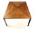 Modern style table with dark toned rosewood complemented by black steel legs and an X structure running through the...