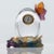 Luxury at its finest, high-end glass ball with a butterfly and clock by Daum, France. A delicate crystal clock encased in...