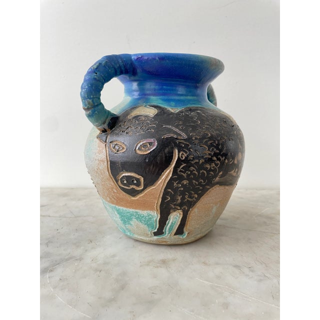 George Johnson, a celebrated ceramics artist from Philadelphia, Pennsylvania, crafted this eccentric urn. A unique...