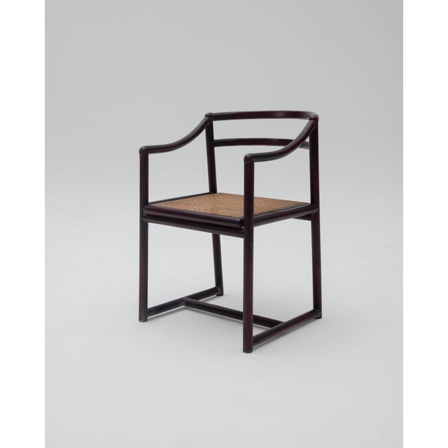 This vintage dining chair from Gasisa is an iconic piece from the 1970s that masterfully blends Eastern design influences...