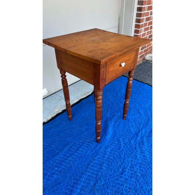A Antique Sheraton Walnut One Drawer Stand, Pennsylvania, Circa 1820's Most likely made in Pennsylvania, circa 1820's...