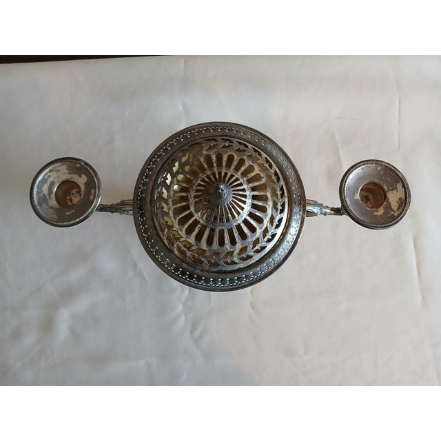 Adorable Meriden silver plate double wedding basket centerpiece. Flower and scroll design. Marking is 2933 Meriden B Co....