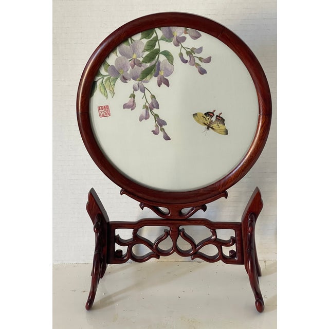 Exceptional delicate elegant carved rosewood stand and round frame for a silk on silk signed embroidery of sweet peas and...