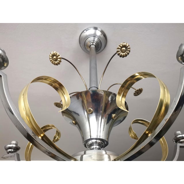 Bring a touch of timeless Parisian elegance into your home with this stunning 1930s Art Deco chandelier. Imported directly...