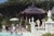 Slim Aarons, Pagoda Poolhouse, Estate Stamped Photographic Print, 1985 / 2020s For Sale