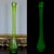 Impressive 26-inch vintage Kanawha Glass swung vase crafted in rare dark uranium glass. The dramatic elongated silhouette...