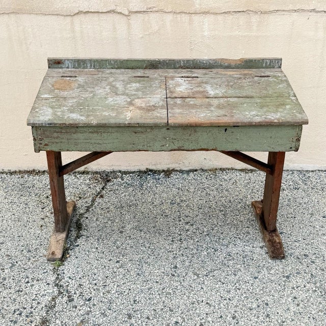 Antique French Country Primitive Green Distress Painted Double Flip Top Wooden School Desk with Cast Iron Accent Supports....