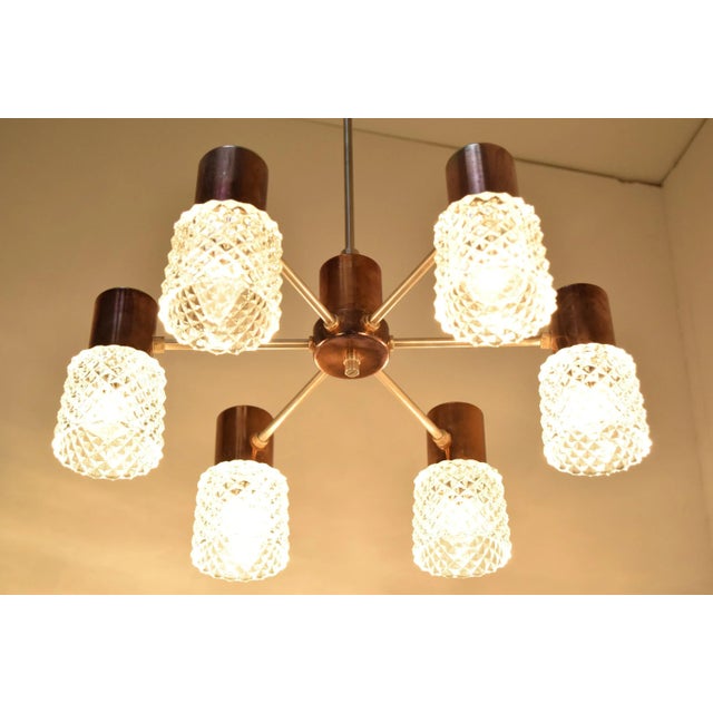 Made in Czechoslovakia Made of glass, copper With aged patina 6x40W,E14 or E15 socket Original condition. This piece is...