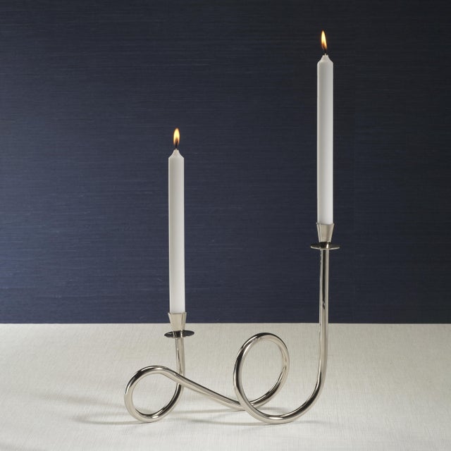 The Breda 2-Tier Brass Candle Holder seamlessly blends modern elegance with practical design. Made of brass and aluminum,...