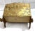 Elevate your living space with this vintage Italian Florentine magazine rack. Featuring intricate gold detailing and...