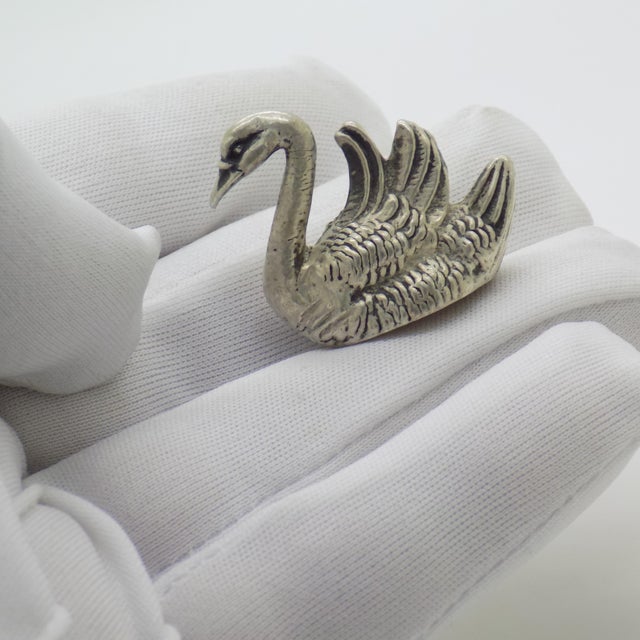 Exemplifying classical Italian decorative elegance, this vintage miniature figurine depicts a detailed swan. Crafted in...