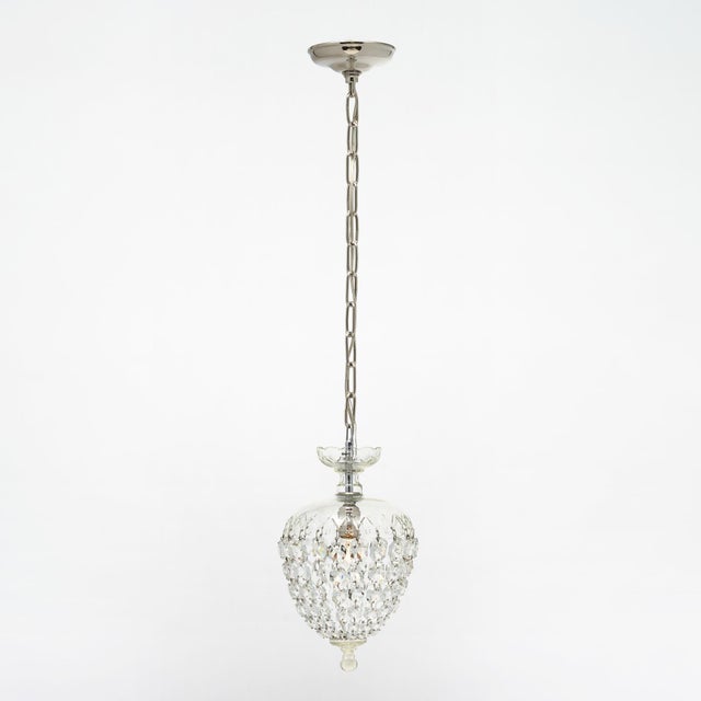 French pendant fixture by Baccarat. This fixture features a hand engraved bell to which are attached a rich array of...