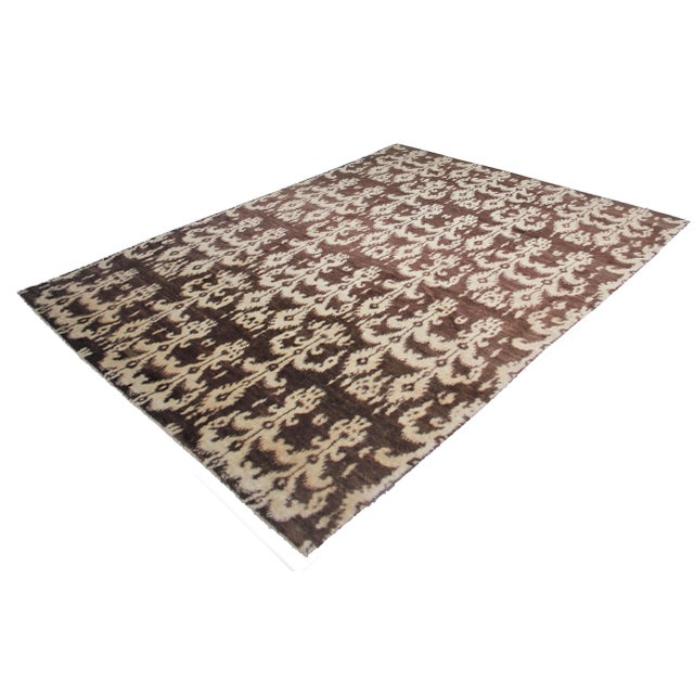 This beautiful Ikat rug is hand knotted in 2020's in Afghanistan with Floral design woven of 75% wool and 25% cotton. This...