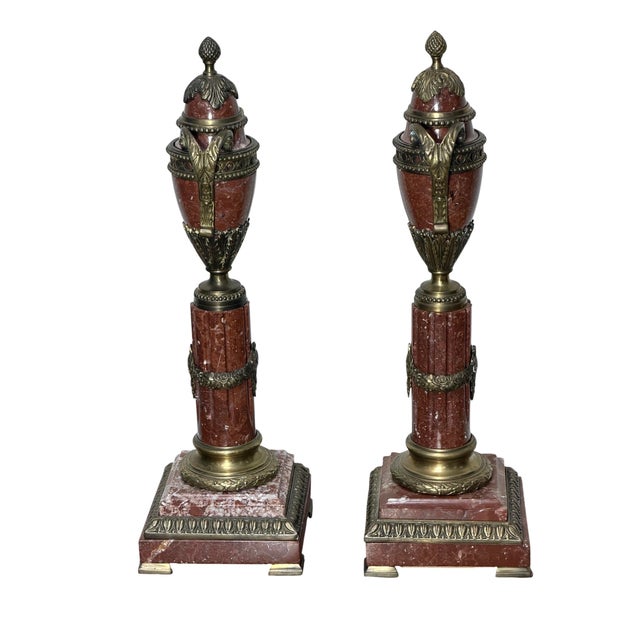 This striking pair of vintage (1990s) neoclassical cassolette urns are from the Biltmore Estate Collection by GCT. They...