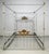 Elevate your bedroom with this striking vintage king-size canopy poster bed, crafted from wrought iron and finished in a...