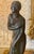 Bronze statuette representing a naked and draped woman entitled "Le Bain de Champagne CARON, Paris". Bronze with brown /...