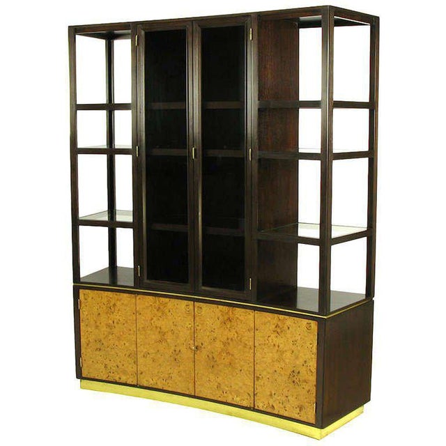 Described in Dunbar catalogs as "#6027 High Piece" this incredible curved front cabinet is constructed of walnut with...