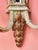 Exceptionally decorative two-armed wall sconce in the spirit of late classicism, decorated with faceted mirror glass, cut...