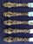 Set of five luncheon knives with sterling silver handles in the Art Nouveau Lily (1902) Pattern by Frank M. Whiting....