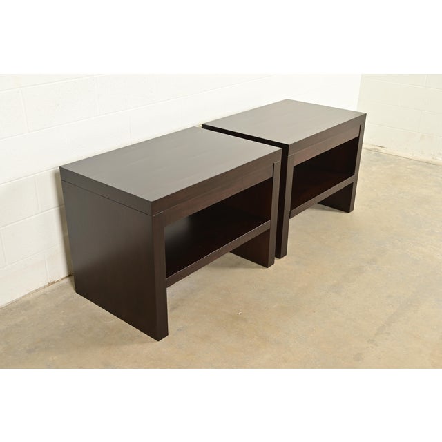 A stylish pair of Modern dark mahogany oversized two-tier bedside tables or nightstands By Barbara Barry for Baker...