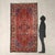 Malayer rug in cotton and wool, large knot, hand-made. This piece is attributed to the mentioned designer/maker. It has no...