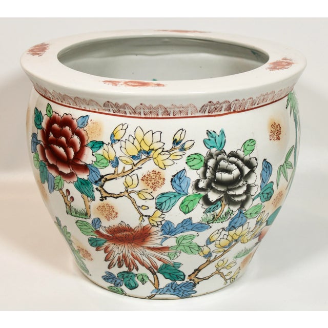 A stunning vintage koi fish interior, flora/ fauna exterior ceramic planter, circa 1950s. This is a beautiful Chinese...