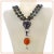 This is a double strand necklace we created with 10 mm charcoal grey translucent faceted with a glass-like luster...