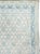 A vintage Indian cotton Agra carpet from the second quarter of the 20th century with a repeating flower design within an...
