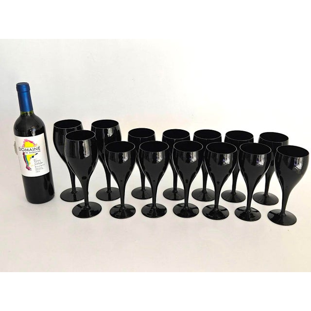 Offered is a chic and sleek set of Midnight Black Wine and Water goblets in the Elegance Elegant pattern made by Mikasa in...