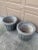A beautifully weathered pair of vintage cast concrete planters featuring an exceptionally detailed trompe-l'œil...