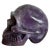 5 1/2"H x 4 1/2"W x 7"D This stunning 10-pound amethyst skull is a remarkable blend of artistry and nature. Carved from a...