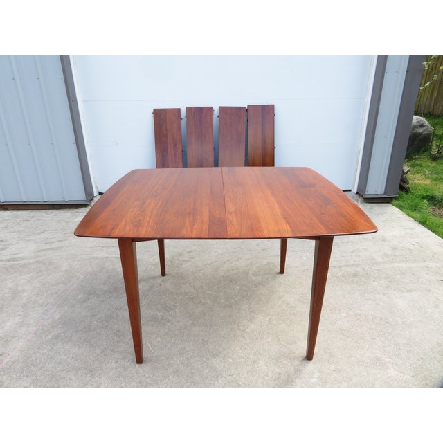 Excellent refinished, true vintage, mid century modern walnut dining table by Ace-Hi Furniture. The table top and the...