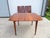 Excellent refinished, true vintage, mid century modern walnut dining table by Ace-Hi Furniture. The table top and the...