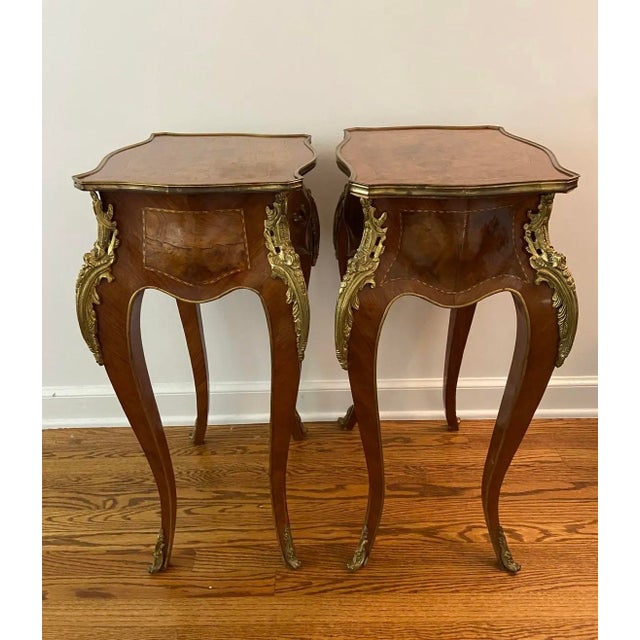 The most beautiful pair of antique Louis XIV style Burled wood and gold ormolu 30” tables…..perfect as petite bedside...