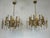 Great vintage condition with normal trace of age and use for this set of two chandeliers made from brass and glass....