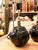 Pair of spherical ceramic lamps from Manises, decorated with a relief motif that evokes a pomegranate. European Plug (up...