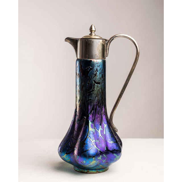 A handled jar produced by Wilhelm Kralik Sohn, Eleonorenhain, representative of the refined Bohemian art glass production...