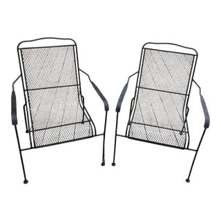 Mid-Century Modern Black Wrought Iron Mesh Patio Lounge Chairs - A Pair For Sale